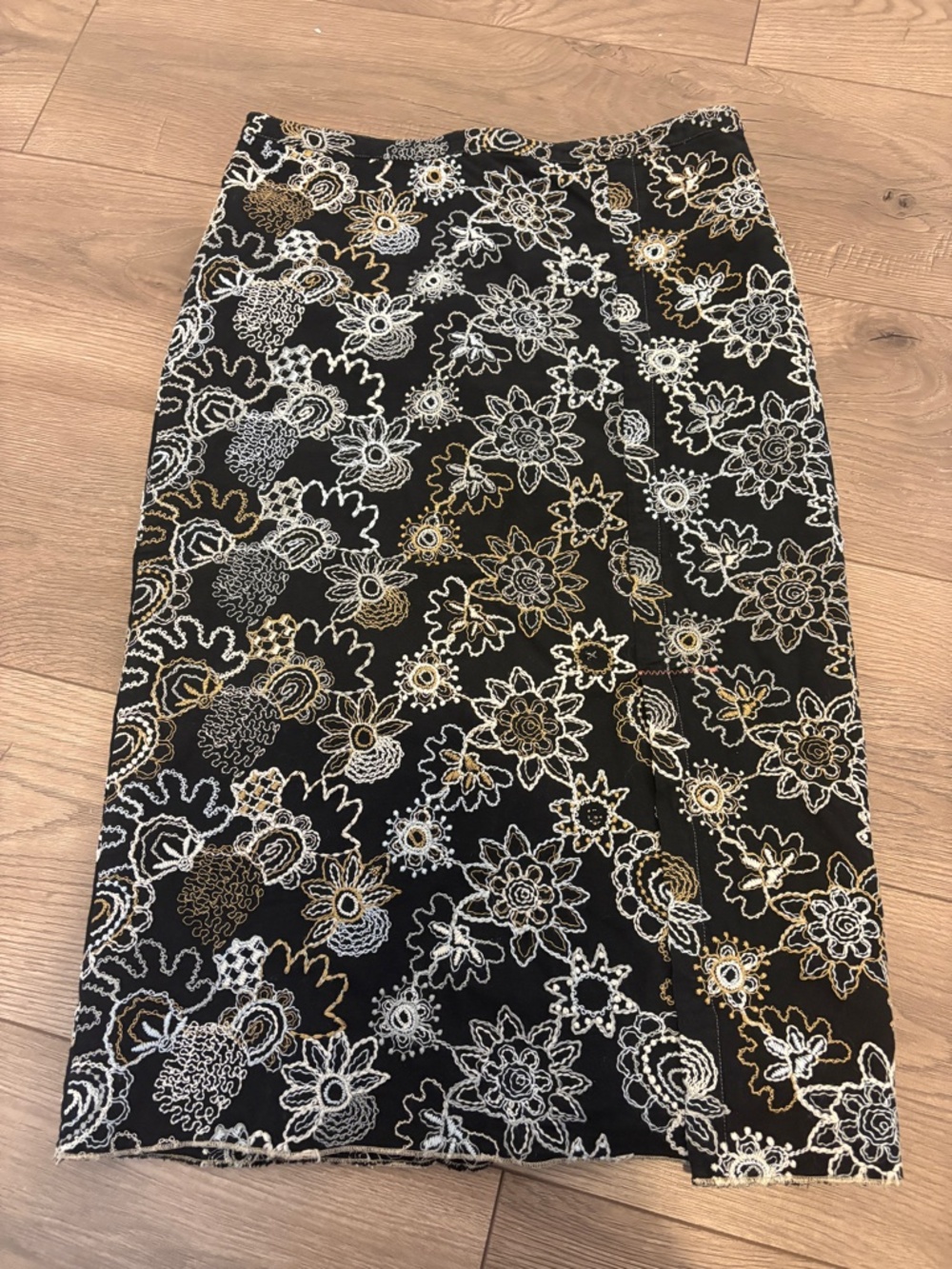 BURNING TORCH black embroidered pencil skirt.